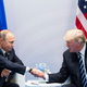 Russian President Vladimir Putin and President Donald Trump shake hands during the G-20 summit in Hamburg, Germany, on July 7, 2017. (Marcellus Stein/AP Images)